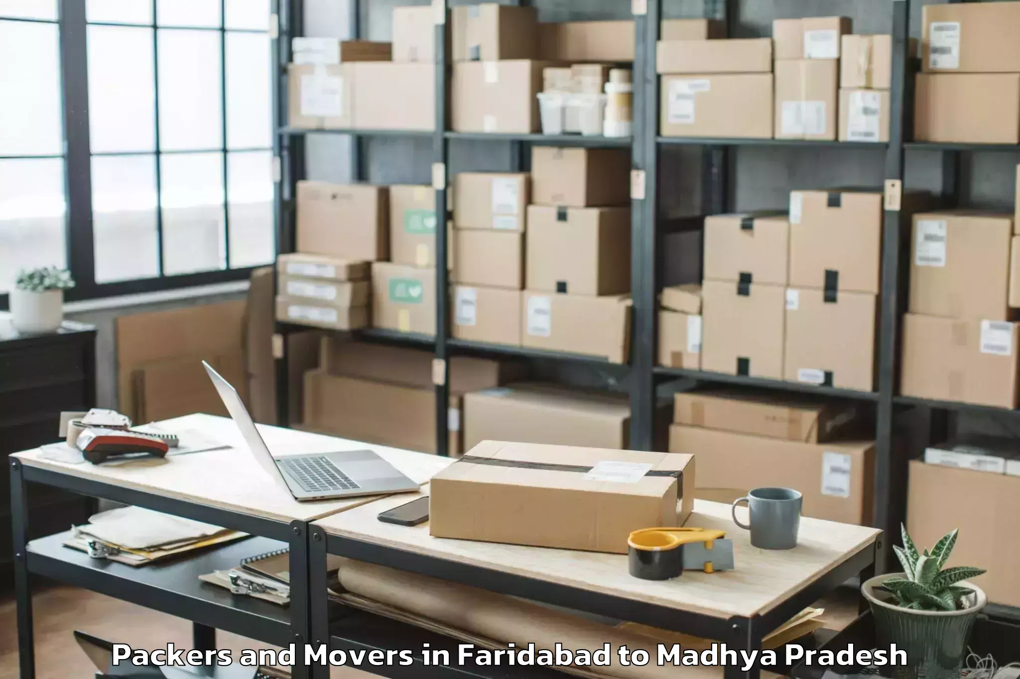 Book Faridabad to Manawar Packers And Movers Online